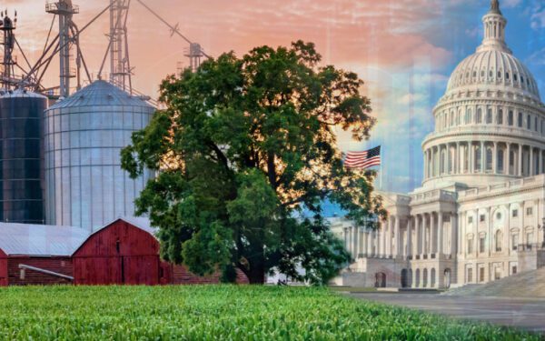 A blended image shows agricultural silos, a barn, and cornfields on the left, seamlessly merging into the U.S. Capitol building with an American flag on the right, symbolizing the intersection of farming and government affairs.