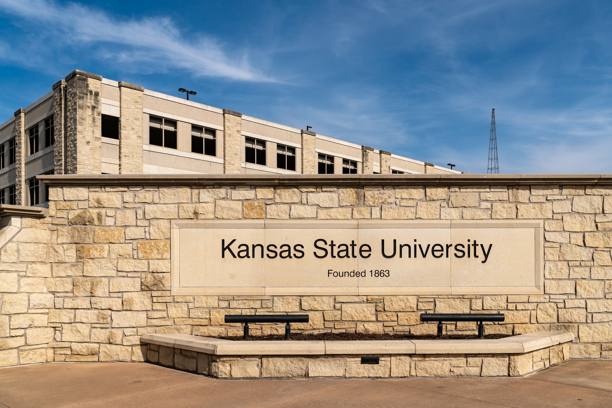 Entrance wall and flags to the campus of Kansas State University.