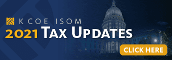 Banner with text "K COE ISOM 2021 Tax Updates" and a "Click Here" button. The background showcases an illuminated domed government building at night, highlighting our tax package insights.