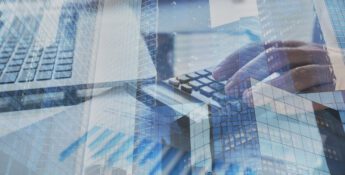 A transparent view of a person's hands calculating with skyscraper reflections, subtly echoing the principles of the Equal Credit Opportunity Act.