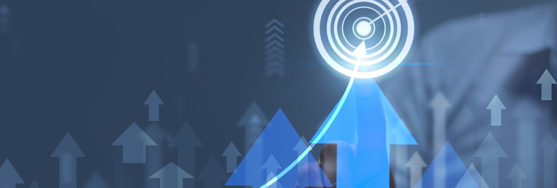 A person touches a virtual target icon, surrounded by upward arrows and a rising graph, symbolizing growth, success, and effective cash flow management on a digital interface.