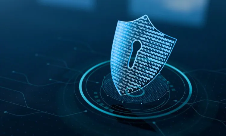 Digital shield with binary code and a keyhole on a blue techno-background, symbolizing cybersecurity.