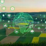Aerial view of farmland with digital icons representing technology and sustainability, and a green globe overlay in the center.