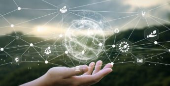 A hand is held up with digital icons and network lines floating above it, representing global connectivity, technology concepts, and the importance of Sustainability Data Management.