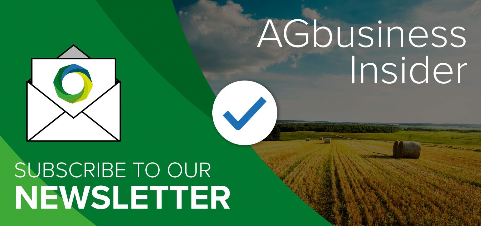 Graphic promoting the AGbusiness Insider newsletter with an envelope icon and a check mark over a background of a rural field with hay bales.
