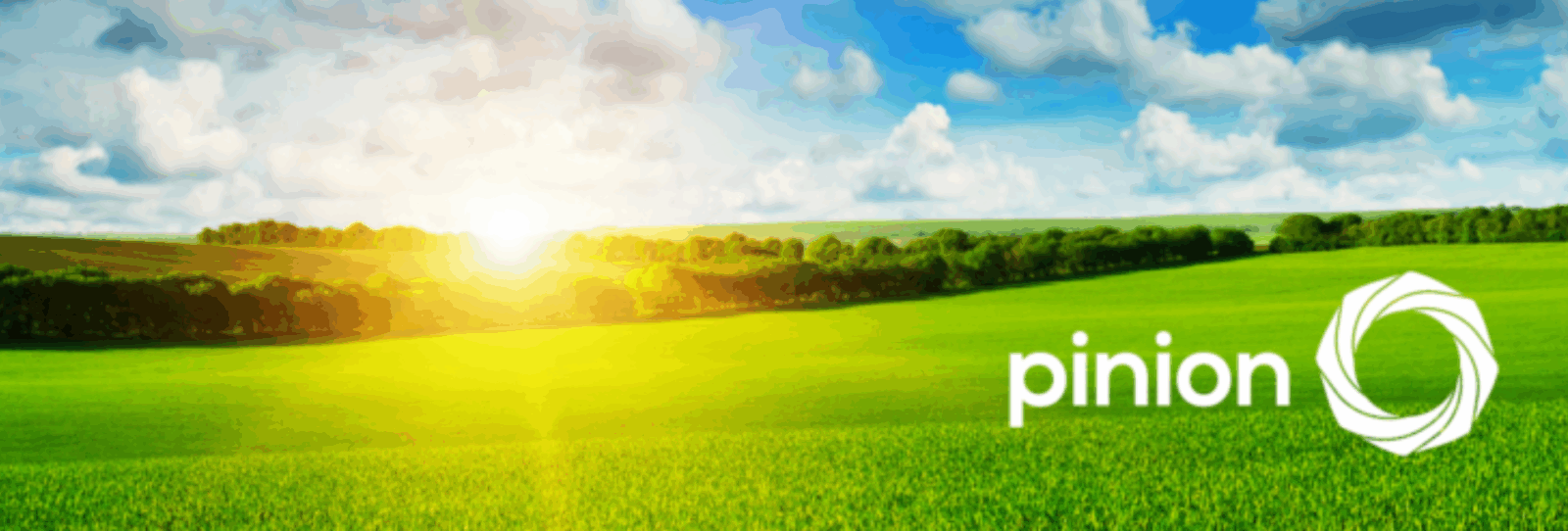 Green field under a blue sky with clouds and sunlight, highlighting the Pinion logo and name in the lower right corner as Pinion Expands Midwest Presence as Gifford & Cox Joins the firm.