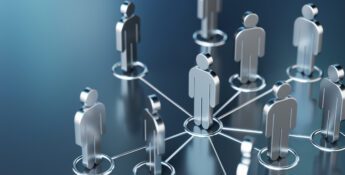 Silver human-shaped figures connected by lines in a network, symbolizing communication, teamwork, or organizational structure on a blue reflective surface.