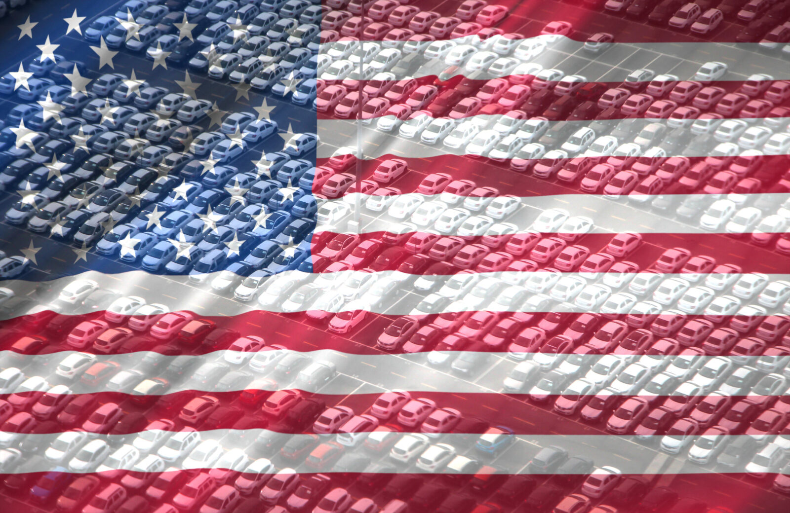 Rows of cars in a parking lot overlaid with a transparent image of the United States flag, symbolizing Charitable Donations With Key Tax Strategies.