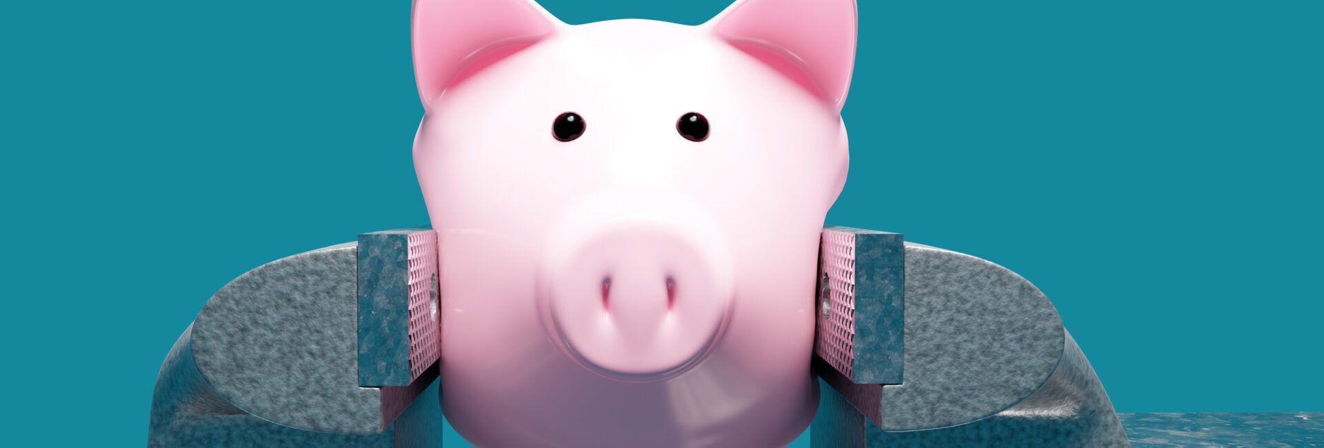 A pink piggy bank is held tightly in a metal vise against a blue background.
